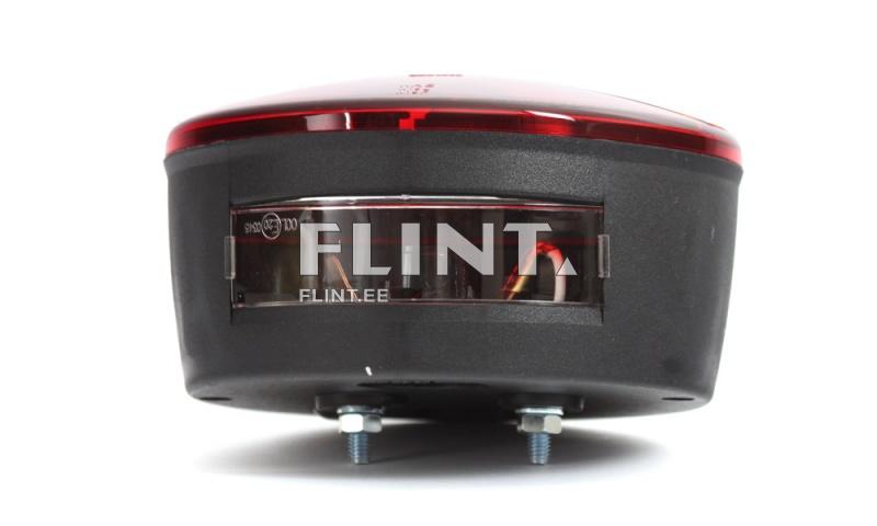 Seade on musta plastiku ja punase kattega, millel on läbipaistev osa, kust on nähtavad siseosad.