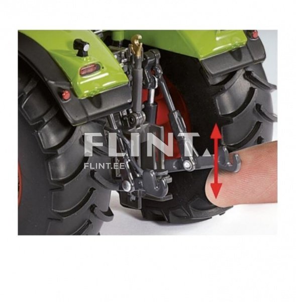 Pildil on traktor, millel on suured mustad rehvid ja roheline kere. Tagumise osa juures on nähtav tõsteelement, mida saab käsitsi reguleerida.