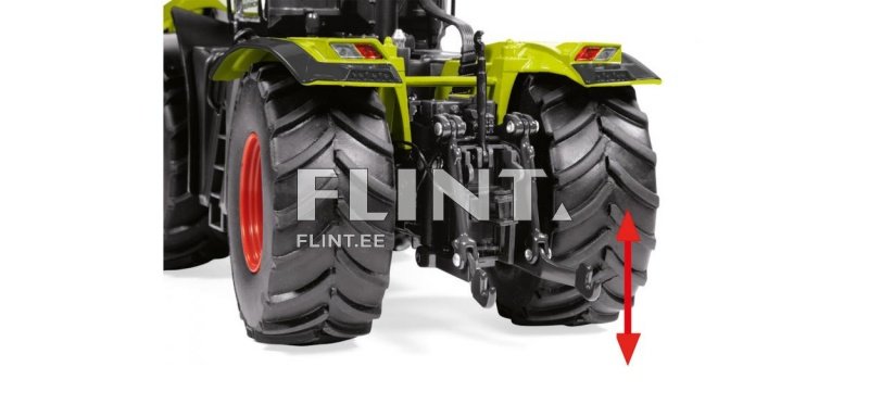 Pildil on traktori tagarehvid, millel on sügavad mustrid. Rattad on suurte õhukeste väliskülgedega, mis on heledates toonides. Traktori taga on nähtavad ka mehhanismid, mis toetavad varustust.