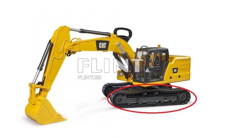 Kollane kaevur, millel on suur küür ja liikuvad rattad. Ruugete rataradade all on mustad ketid. Ülemises osas on rõngas, mis hoiab juhikabiini.