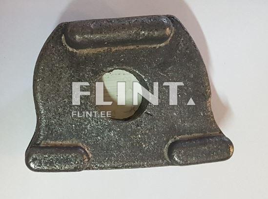 Toode on võib-olla metallist, tumedate hallide toonidega, lapik ja peaaegu ruudukujuline. Keskel on suur ümmargune auk, mille kaudu võib-olla on looduslik valge värv. Kaks kumerat serva asuvad tootest mõlemal küljel.