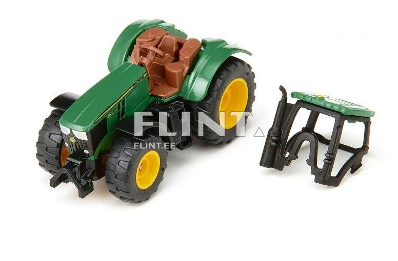 Roheline plastmasstraktor, millel on pruun iste ja suured kollased rehvid. Traktori küljes on eraldatud must kapp.