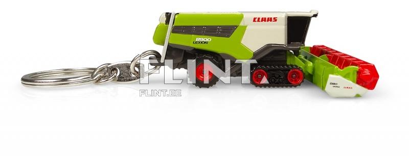 Miniatuurne rohelise ja valge värviga viljaterade kombain, mille küljel on punased rattad. Kombain on kinnitatud võtmehoidjale.