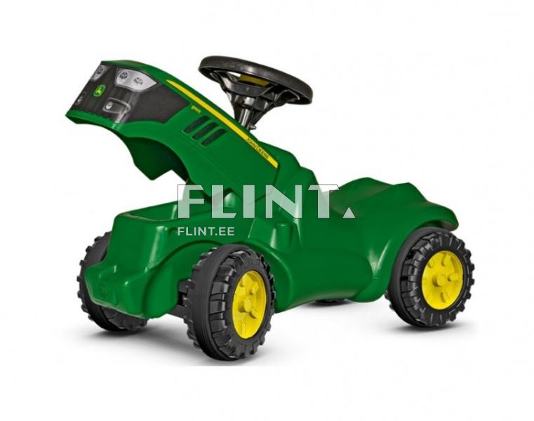 Rohul rohelise ja kollase värvusega lastele mõeldud tõukeratas, millel on ulatuslik juhthoob ja suur tagaratas.